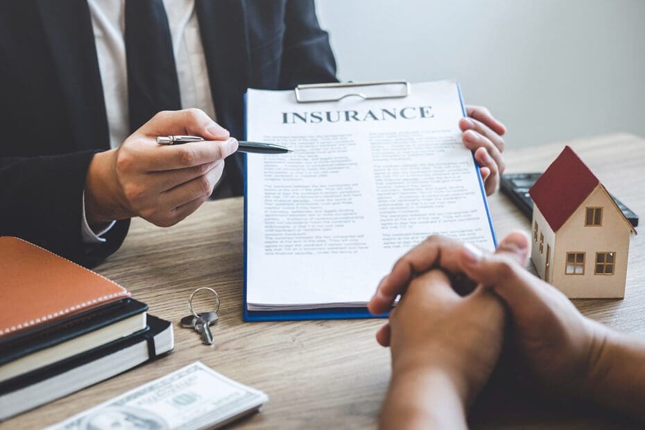 Agent-Reviews-title-insurance-before-a-home-sale